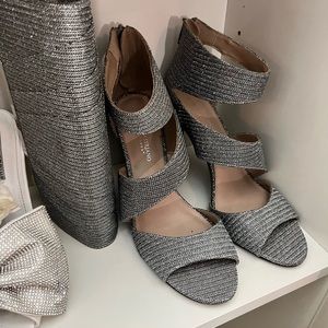 Sparkling silver heels with matching clutch